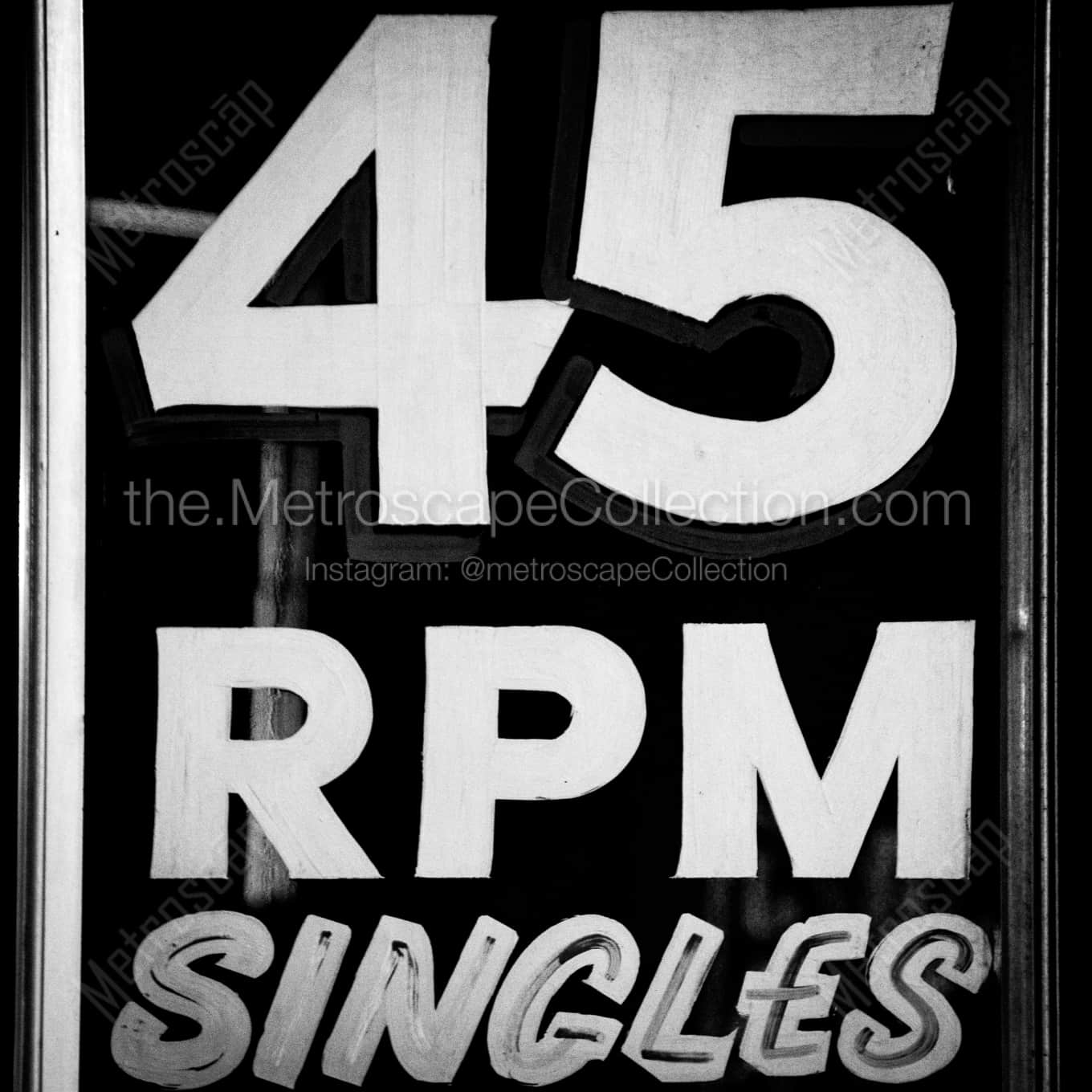 45 RPM Singles Window Display architecture black and white Photography 45 RPM Singles Window Display architecture black and white Photography square crop