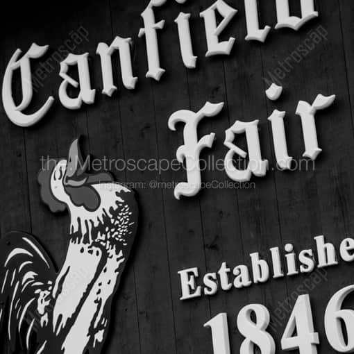 Matte Black MDF Framed Black and White Canfield Photograph: The Brown Canfield Fair Sign in a Square Matte Black MDF Frame