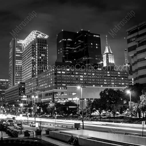 Baltimore Framed Photos of Traffic in the Foreground of the Baltimore Skyline Along Pratt Street Traffic in the Foreground of the Baltimore Skyline Along Pratt Street -- Baltimore Black and White Framed Photos