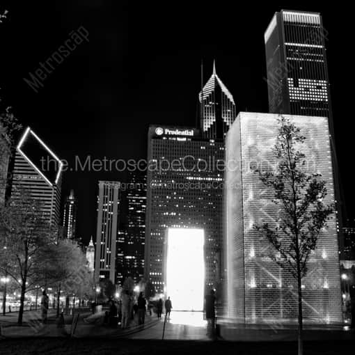 Chicago Framed Photos of A Sapling is Silhouetted by the Crown Fountain in Millennium Park A Sapling is Silhouetted by the Crown Fountain in Millennium Park -- Chicago Black and White Framed Photos