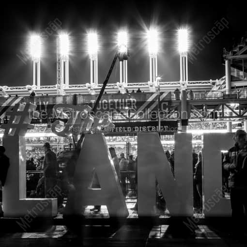 Cleveland Framed Photos of The Land Social Media Sign behind Left Field of Progressive Field The Land Social Media Sign behind Left Field of Progressive Field -- Cleveland Black and White Framed Photos