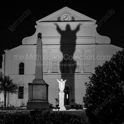 The Statue and Shadow of Jesus on St Louis Cathedral -- New Orleans Black and White Framed Photos