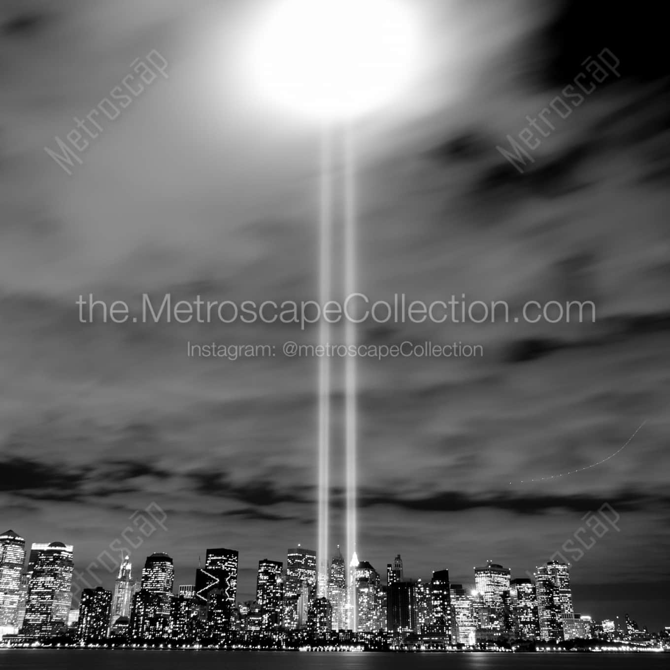 The Beams of Light from Lower Manhattan Bounce off of the Low Clouds Framed Photos square crop