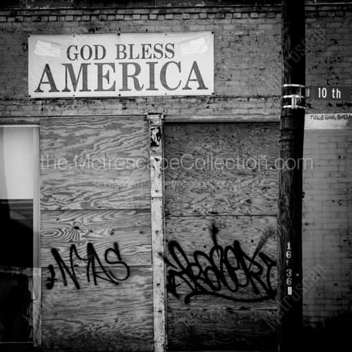 Toledo Framed Photos of A God Bless America Banner above a Dilapidated Building in Toledo A God Bless America Banner above a Dilapidated Building in Toledo -- Toledo Black and White Framed Photos