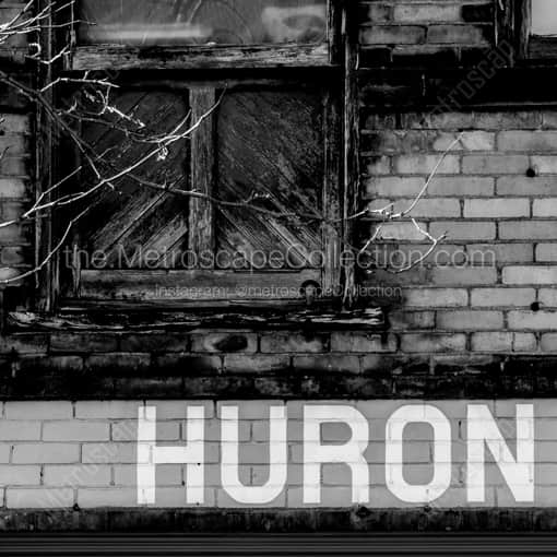 Toledo Framed Photos of A Huron Street Sign Painted onto a Building in Downtown Toledo A Huron Street Sign Painted onto a Building in Downtown Toledo -- Toledo Black and White Framed Photos