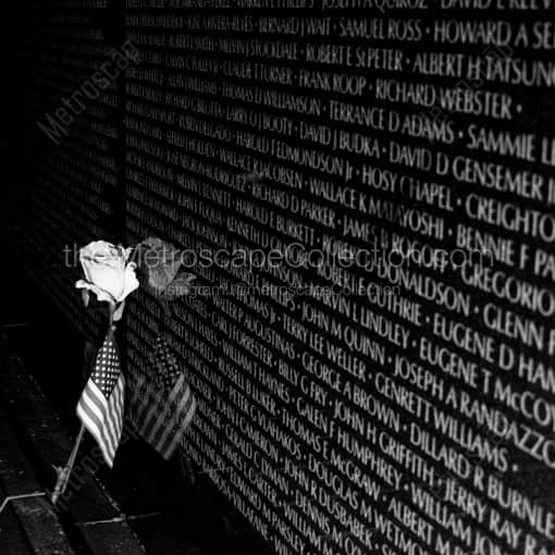 Washington DC Framed Photos of A Rose and American Flag Leans Against the Vietnam Wall A Rose and American Flag Leans Against the Vietnam Wall -- Washington DC Black and White Framed Photos