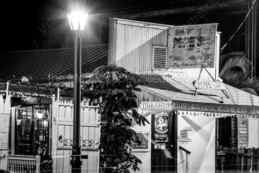Key West Black and White Photography of Pepes Cafe Eldest Eating House in Florida Keys at Night Pepes Cafe Eldest Eating House in Florida Keys at Night -- Key West Black and White Photography