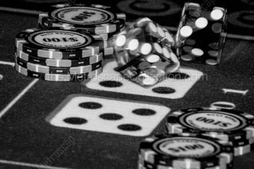 A Craps Table with Rolling Dice -- Las Vegas Black and White Photos