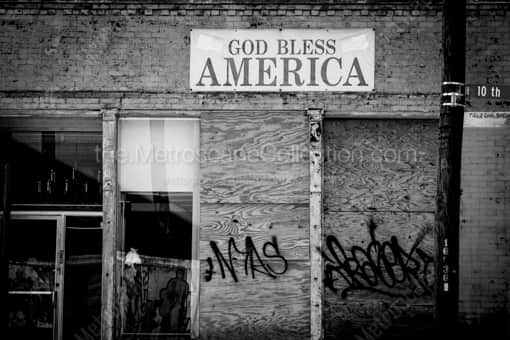 Toledo Black and White Photography of A God Bless America Banner above a Dilapidated Building in Toledo A God Bless America Banner above a Dilapidated Building in Toledo -- Toledo Black and White Photography