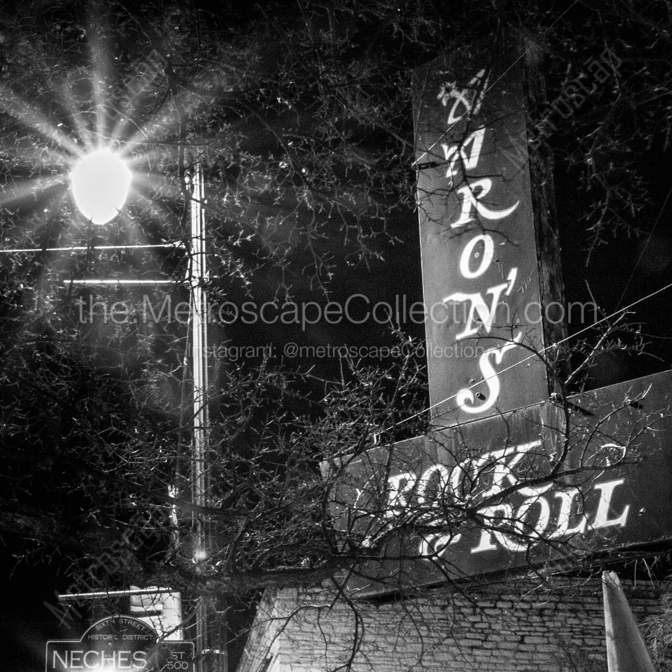 Aarons Rock and Roll at Sixth and Neches night time black and white Photography square crop