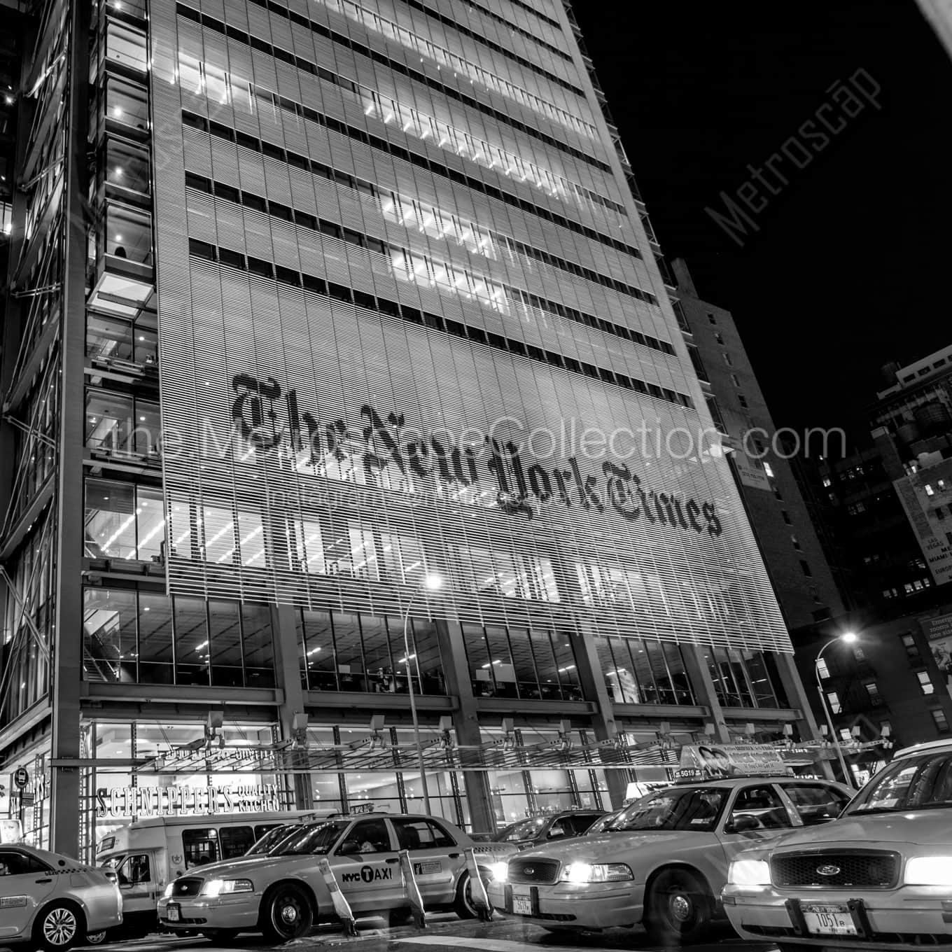 Cabs on Eighth Street at the Times Building and Port Authority Bus Terminal night time black and white Photography square crop