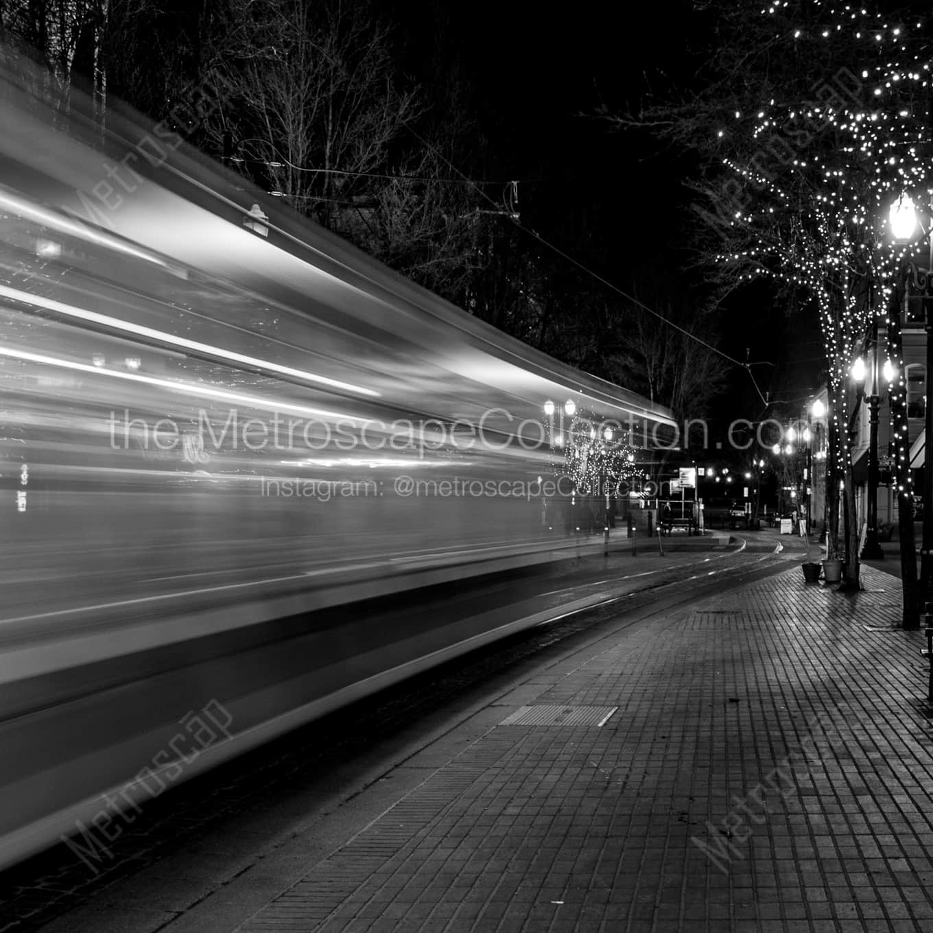 A Streetcar Streaking Down Yamhill Street night time black and white Photography square crop