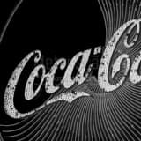 Square The Neon Pinwheel Coke Sign in Downtown Atlanta Framed Photos