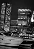 Vertical The Baltimore Skyline Featuring the Legg Mason Building and Inner Harbor Boats Photography