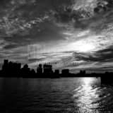 Square A Dramatic Sunset Behind the Boston Skyline Framed Photos