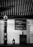 Vertical The Old Style Texaco Gas Pumps in Canfield black and white Photos