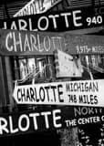Vertical The Charlotte Signpost at The Green black and white Photos
