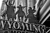 Horizontal Silhouette of Cowboys Riding Horses Photography