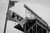 Horizontal A W Flag on Waveband behind Wrigley Field landscape black and white Photography