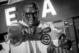 Horizontal A Green Apple in the Harry Caray Statue during the 2016 World Series landscape black and white Photography