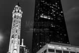 Horizontal The Old Chicago Water Tower is Dwarfed by the Hancock Tower landscape black and white Photography