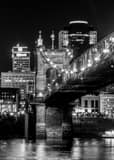 Vertical The Cincinnati Skyline from Covington featuring the Roebling Bridge black and white Photos
