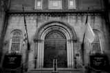 Horizontal The Front Door of the Old Stone Church in Public Square black and white Photos