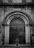Vertical The Front Door of the Old Stone Church in Public Square black and white Photos