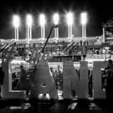 Square The Land Social Media Sign behind Left Field of Progressive Field black and white Photos
