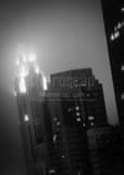 Vertical Fog Engulfs the Top of the LeVeque Tower Framed Photos