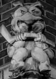 Vertical A Stinger Gargoyle in the Arena District Framed Photos