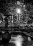 Vertical The Umbrella Girl Fountain in Schiller Park black and white Photos