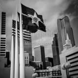 Square Dallas, Texas and United States Flags outside of Dallas City Hall Framed Photos
