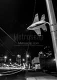 Vertical A Fighter Jet Street Lamp in Downtown Dayton black and white Photos