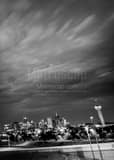 Vertical Clouds Sweep over the Denver Skyline landscape black and white Photography