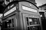 Horizontal British Telephone Booth black and white Photos