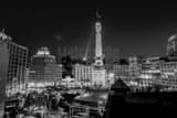 Horizontal Monument Circle and Ninja Warrior at Night black and white Photography