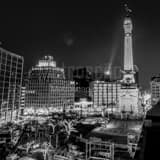 Square Monument Circle and Ninja Warrior at Night black and white Photography