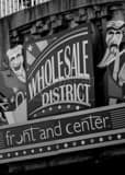 Vertical The Wholesale District Sign black and white Photography