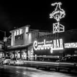 Square The Million Dollar Cowboy Bar at Night black and white Photos