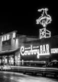 Vertical The Million Dollar Cowboy Bar at Night black and white Photos