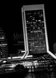 Vertical Go Jaguars in the Windows of the Independent Square Building black and white Photos