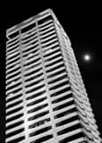 Vertical The Riverplace Building and Full Moon black and white Photos