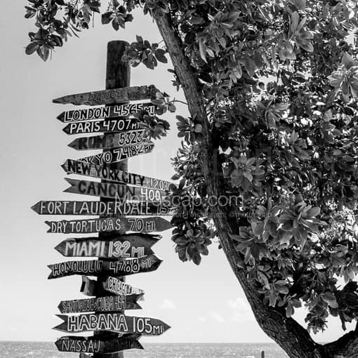 Key West Black and White Photography of A Key West Mileage Signpost to Other Cities A Key West Mileage Signpost to Other Cities -- Key West Black and White Photography