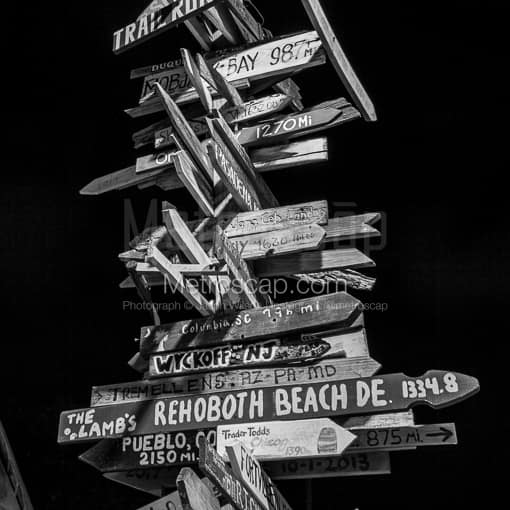 A Key West Mileage Sign Post at Night -- Key West Black and White Photography
