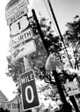 Vertical Mile Zero Sign black and white Photos