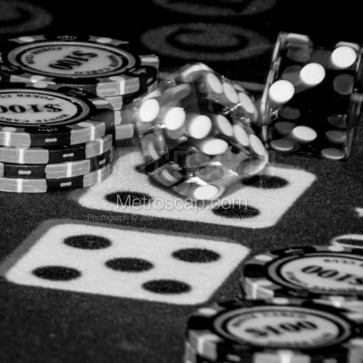 A Craps Table with Rolling Dice -- Las Vegas Black and White Photography