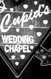 Vertical Cupids Wedding Chapel Framed Photos