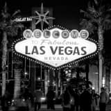 Square Tourists Gathered around the Fabulous Las Vegas Sign Framed Photos