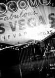 Vertical Close Up Zoom Out of the Las Vegas Sign Framed Photos
